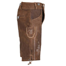 A pair of brown suede leather lderhosen with decorative stitching, side pockets, and silver metal snap closures on the hips, shown against a plain white background.