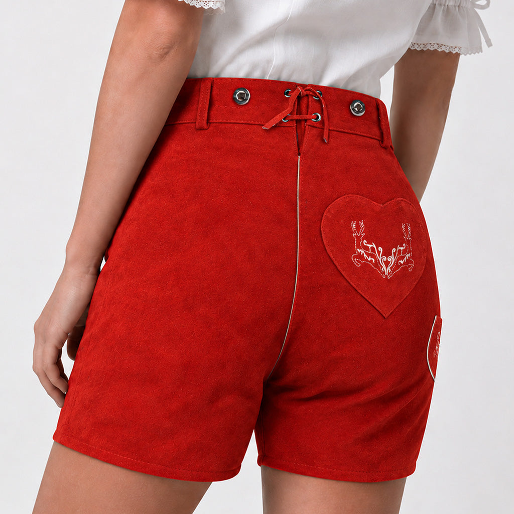 Rear view of Womens Red Suede Leather Lederhosen Oktoberfest Outfit showing embroidered heart pocket and adjustable waist lacing