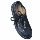 Overhead angled view of Gentry Choice Oktoberfest shoes showing lace-up detail and embroidery