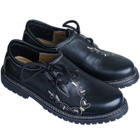 Pair of black Bavarian Oktoberfest shoes with cream oak-branch embroidery and lace-up front