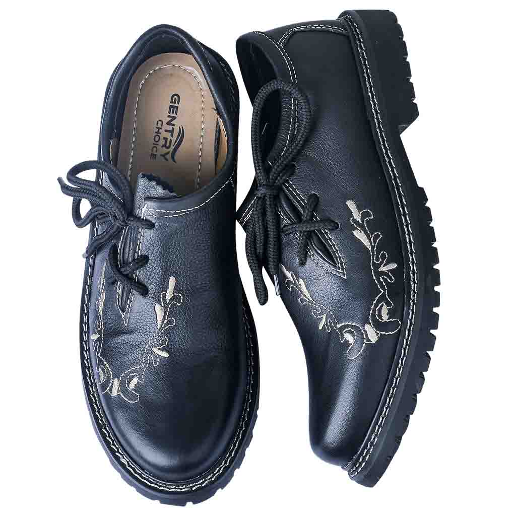 Top-down view of Gentry Choice Bavarian shoes showing branded insole and embroidered toe design