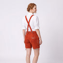 Model wearing Womens Red Suede Leather Lederhosen Oktoberfest Outfit showing crossed suspenders and embroidered heart back pocket