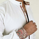 Close-up of traditional Bavarian shirt collar less embroidery detail on collar and cuff