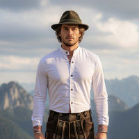 Detailed view of traditional Bavarian lederhosen shirt with embroidery pattern on shirt cuff