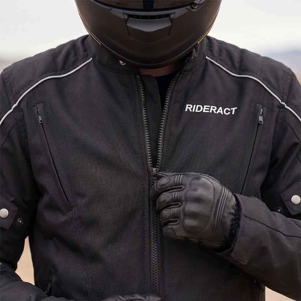 Close-up view of RiderACT motorcycle jacket with durable Cordura fabric and zipper details